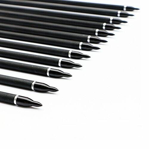 Array of black ballpoint pens aligned in rows.